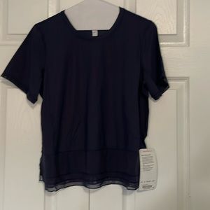 Sole training SS - Lululemon size 8 .  Added Lycra for stretch/shape.  Dark blue